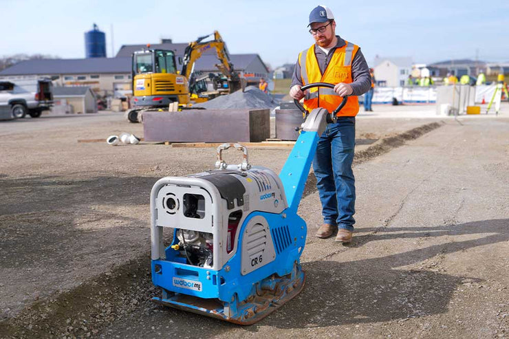 Hardscaper using the CR 6 Compactor