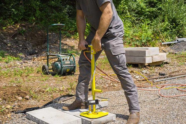 Hardscaper using ES Adjustable T-Handle to pick up stone slab