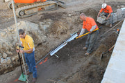 Men Using Wall Screed System