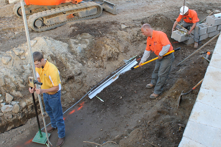 Men Using Wall Screed System